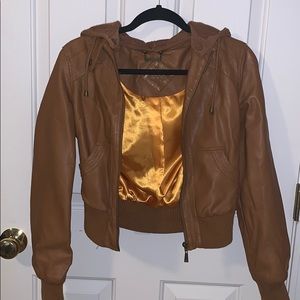 Cropped tan faux leather bomber jacket with hood